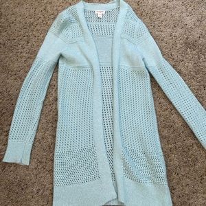 Baby blue cardigan.